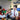 Employees celebrating in an office with gourmet gift hampers and beverages, showcasing corporate gifts in Singapore that strengthen workplace relationships and appreciation.