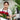 Florist arranging fresh red roses for a bouquet in Singapore, showcasing premium roses carefully prepared for romantic gifts, anniversaries, and special occasions.